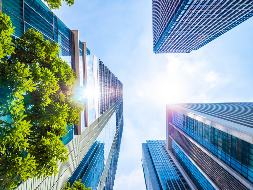 EPBD green houses with beautiful skyscraper and glass window exterior around city business area